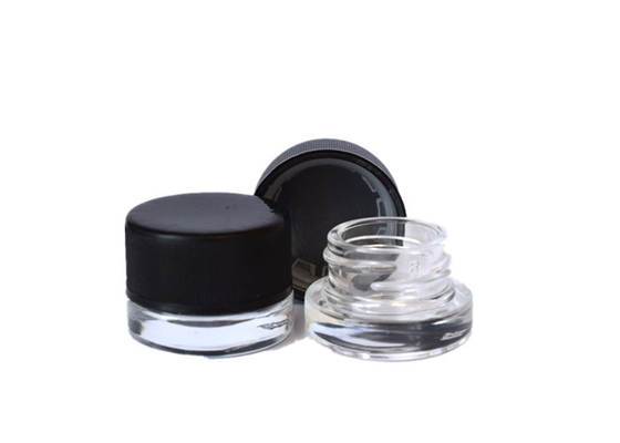 Un récipient en verre transparent et concentré durable, 5 ml avec un couvercle à l' épreuve des enfants.